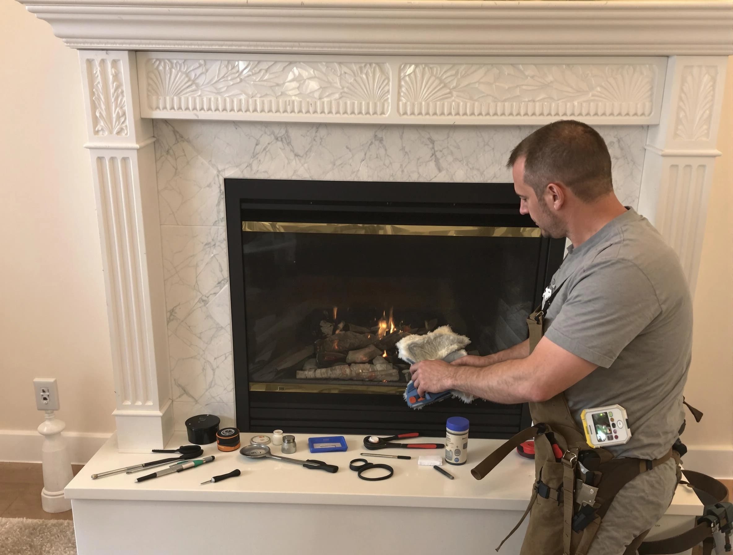 Lehi Chimney Sweep performing fireplace maintenance in Lehi, UT